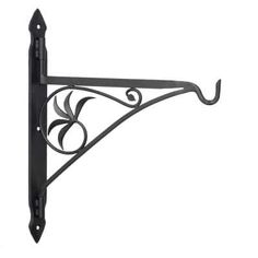 a black metal shelf bracket with an ornate design on the top and bottom corner,