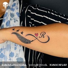 a woman's arm with a tattoo on it that says love and an arrow