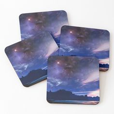 four coasters with the sky and stars in them