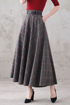 Relaxed Skirt With Pockets For Fall, Fall Flared Skirt With Pockets, Fall Flared Skirt Bottoms With Pockets, Winter Full Skirt Bottoms With Pockets, Long Skirt With Pockets For Fall, Long Fall Skirt With Pockets, Lined Flared Skirt For Fall, Winter Flared Skirt With Pockets, Fall Flared Lined Skirt