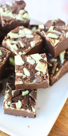 Make your dessert extra special with this Mint Chocolate Fudge featuring Andes Mints! Packed with chopped Andes Mints, this fudge delivers a burst of minty chocolate goodness in every bite. The creamy texture and rich flavor make it the perfect treat for any celebration or holiday. Whip up this easy recipe and enjoy a minty, chocolaty dessert that’s sure to impress! Andes Mint Fudge Recipe, Andes Mint Fudge, Mint Fudge Recipe, Mint Chocolate Fudge, Mint Chocolate Candy, Mint Fudge, Andes Mints, Cookies And Cream Fudge, Holiday Fudge