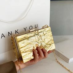 Metal Box Shiny Gold Silver Luxury Clutch Hand Pouch SIZEBig  (Width)18cm * (Height)11cm * (Thickness)6cm  Note:1 Inch=2.54 CM; 1 CM=0.39 Inch , Due to different batches, bag's liner may be different. Fashion designer and good price, please rest assured purchase. ( All pictures are actual photos. But due to the different light and monitor setting, minor color difference maybe exist. Thank you for understanding. ) Gold Pouch Evening Bag With Gold-tone Hardware, Elegant Pouch Clutch With Gold-tone Hardware, Gold-tone Pouch Clutch For Shopping, Gold Clutch Box Bag With Gold-tone Hardware, Luxury Hand-embellished Gold Clutch, Luxury Clutch, Eco Luxury, Soft Leather Bag, Chic Leather