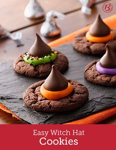 chocolate cookies decorated with candy and witches hats