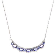 Colleen Lopez Tanzanite and White Zircon Curved Bar Necklace Exude sophistication and style with this curved bar necklace featuring a pretty scalloped design of tanzanite and white zircon. With an 18" length and adjustable clasps at 16", 17", and 18", it's a versatile piece that can be worn with any outfit.       Approx. 18"L with clasps at 16", 17" and 18"     Drop approx. 1-11/16"L x 1/4"W     Stamped .925 sterling silver; rhodium plating     Cable chain with lobster-claw clasp   Stone Informa Scalloped Design, Curved Bar, Color Bands, Wedding Watch, Bar Necklace, Necklace Handmade, Cable Chain, Handmade Necklaces, Lobster Claw