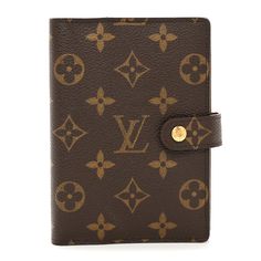 This is an authentic LOUIS VUITTON Monogram Small Ring Agenda Cover. This agenda features a monogram coated canvas exterior in brown and terracotta crossgrain leather interior. The snap opens to a brass 6-ring binder for inserts, three card slots, two side pockets, and a pen loop. Agenda Cover, Small Ring, Small Rings, A Monogram, Ring Binder, A Pen, Leather Interior, Authentic Louis Vuitton, Louis Vuitton Monogram