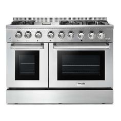 an oven with four burners and two doors on the front, in stainless steel