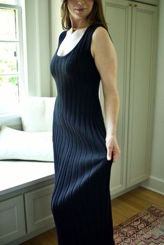 With its sultry fit and flare silhouette and stretchy ribbed fabric, this black maxi is anything but basic. Maxi length Fit & flare silhouette with pleated skirt Ribbed, stretch sweater knit fabric Scoop neck Fabric: viscose/poly SIZE GUIDE Measurements are approximate and taken while laying flat across the front. Not doubled. Small - Bust: 13”Length: 53.5” Medium - Bust: 14”Length: 54” Large - Bust: 15”Length: 54.5” Try-On Mom Journal, Jumpsuit Skirt, Baby Sale, Hair Fragrance, Black Maxi, Sweater Knit, Large Bust, Sweater And Shorts, Ribbed Fabric