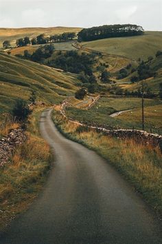 an empty country road in the middle of nowhere