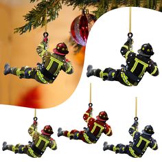 fireman ornament hanging from a christmas tree with ornaments in the shape of figures