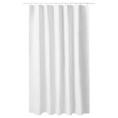 a white shower curtain hanging on the side of a wall