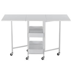 a white table with wheels and shelves on the bottom, in front of a white background