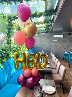 balloons are floating in the air at a restaurant