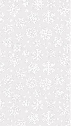 white snowflakes on a light gray background