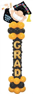 a graduation balloon with the word grad on it