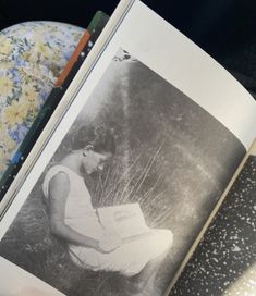 an open book sitting on top of a table