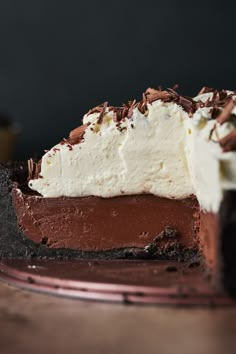 a piece of chocolate pie with white frosting