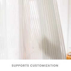 a white curtain with the words supports customization