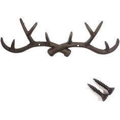 an antler hook and two screws on a white background