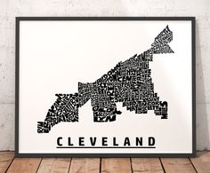 a black and white poster with the word cleveland written all over it