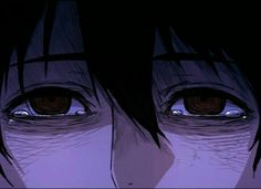 an anime character's eyes are shown in the dark