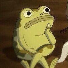 a cartoon frog sitting next to a bird on top of a wooden floor in front of a mirror