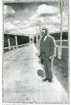 a man is standing in the middle of a road with many words all over it