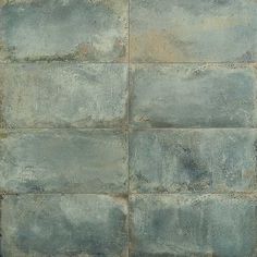 an image of a tile floor that looks like it is made out of cement blocks