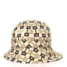 This is an authentic GUCCI New Canvas Horsebit Alina Bucket Hat size M in Beige and Multicolor. This stylish hat is crafted of beige canvas with the classic GG monogram and a brown GG logo on the front. Gg Monogram, Gg Logo, Stylish Hats, Hat Sizes, Bucket Hat, Monogram, Gucci, ? Logo, Hats