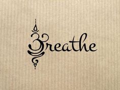 the word breathe written in cursive writing on a brown background with black ink