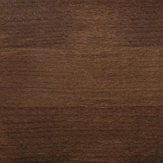 a close up view of the wood grains on this table top, showing dark brown color