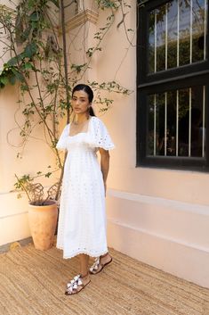 The sweetest white midi- meet, Tafiya. She's crafted in perforated polka dotted embroideries and edged with scalloped cutwork lacing. Elasticated shoulders, fit and flare fit and a tie at the back makes her a summer go-to. The model is wearing size S. 🌸 〰️〰️〰️ 🌸 〰️〰️〰️ 🌸 Care and Composition100% Viscose.Dry clean/Hand wash in cold water. Mild liquid detergent only. Do not soak or wring. Designed & Made in India. White Midi, Liquid Detergent, Clean Hands, Cut Work, Xl Dress, Fit And Flare, Cold Water, Dry Clean, Hand Wash