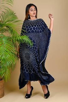 Indigo blue kaftan style dress with Bandhani motifs and handcrafted silk potli neckline.
Component: 1
Neckine: Round
Sleeve Length: Three quarter
Fabric: Gajji Silk
Color: Blue
Flared sleeves - Aza Fashions Bandhani Motifs, Kaftan Style Dresses, Bandhani Dress, Black Kaftan, Tunics Online, Kaftan Style, Batik Dress, Black Tunic, Womens Tunics