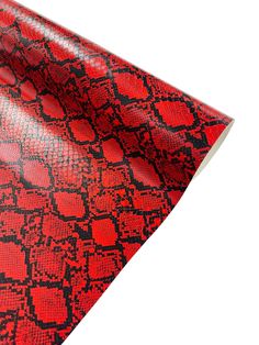 a red and black snake skin wrapping paper