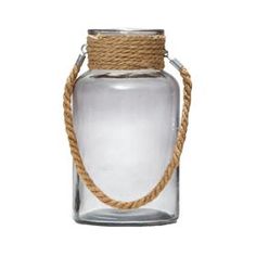 a glass jar with rope around it