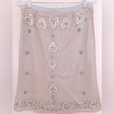 Nwt Tracy Reese Skirt Crystal Embellished Mesh Over Silk Floral Underskirt Crystal Embellished Heart Motif Nude Mesh Outer Skirt Aqua Silk Over Skirt Contrasting Waistband Hidden Side Zipper Tags Intact Replace Crystals/Beads Included Flat Measurements: Waist- 14.5” Length- 23” Nwt Gorgeous Condition - New With Tags - Never Worn Pet Free. Smoke Free. Elegant Embellished Pencil Skirt, Glamorous Long Skirt For Festive Occasions, Glamorous Long Festive Skirt, Glamorous Embellished Pencil Skirt, Glamorous Embellished Long Skirt, Glamorous Long Embellished Skirt, Fitted Embellished Summer Skirt, Embellished Fitted Long Skirt, Embellished Long Evening Skirt