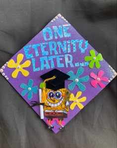 a purple and yellow graduation cap with the words, one termito later on it