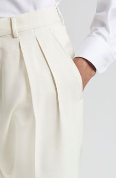 Tom Ford's contemporary elegance shines through in the masterful tailoring of resort-ready trousers crafted from fresh, luxurious silk. 37" inseam; 15" leg opening; 12" front rise; 17 1/2" back rise (size 48EU) Zip fly with hook-and-bar closure Front slant pockets Partially lined 100% silk Dry clean Made in Italy Designer Clothing Designer Clothing Brands, Tom Ford Men, Silk Trousers, Atticus, Contemporary Outfits, Silk Pants, Wool Pants, Silk Twill, Blue Pants