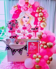 a pink and gold birthday party with balloons, decorations and table cloths in the shape of a barbie doll