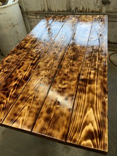 the table is made out of wood and ready to be polished or varinated