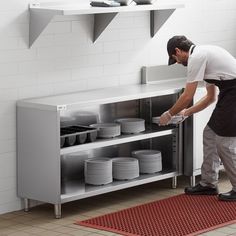 Keep your dishes, flatware, and glassware hidden and out of harm's way with this Regency 18" x 60" stainless steel dish cabinet. Constructed of 18 gauge type 304 stainless steel, this cabinet is built tough to withstand the wear and tear of a busy commercial kitchen. The 60" long top provides an ample amount of space for staging clean plates and other tableware that is ready for table service, while the shallow 18" width takes up minimal walking space in the kitchen.  An adjustable shelf can be Vineyard Kitchen, Kitchen Equipment Storage, Kitchen Cutlery Storage, Restaurant Cabinet, Restaurant Kitchen Equipment, Dish Cabinet, Steel Restaurant, Kitchen Cupboard Designs, Commercial Kitchen Equipment