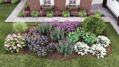 an aerial view of a house with flowers in the front yard