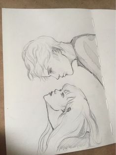 a drawing of two people facing each other