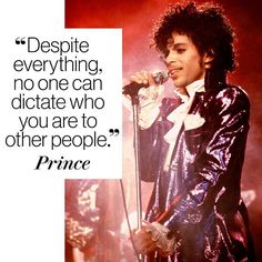 prince on stage holding a microphone in front of a quote that reads despite everything, no one can dictate who you are to other people