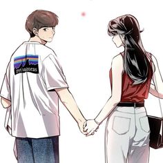 a man and woman holding hands while standing next to each other