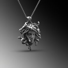 This expertly crafted Silver Medusa Head Pendant necklace casts a spell of captivation on all those who wear it! A bold piece for anyone who loves Mythical Jewelry . Buy for yourself or give it as a gift for that special someone in your life! ★Item Details ◆ Material : 925K Sterling Silver ◆ Pendant Height : 1.37 inch x 3.5 cm ◆ Bail Height : 0.39 inch x 1 cm ◆ Bail With : Suitable for up to  0.19 inch x 5.00 mm Chain ◆ Rolo Chain Thickness : 0.059 inch x 1.5 mm | Foxtail Chain Thickness : 0.078 inch x 2 mm ◆ Pendant Weight : 21 Grams ◆ Rolo Chain Weight : 18 Inches - (45cm) = 4.50 Gr 20 Inches - (50cm) = 5Gr 22 Inches - (55cm) = 5.50 Gr 24 Inches - (60cm) = 6.05 Gr 26 Inches - (65cm) = 6.60 Gr 28 Inches - (70cm) = 7.12 Gr ◆ Foxtail Large Chain Weight / 28 Inches - (70cm) : 15 gr ◆ Chain T Medusa Pendant Necklace, Mythical Jewelry, Medusa Jewelry, Medusa Necklace, Gorgon Medusa, Medusa Pendant, Turn To Stone, Head Necklace, Large Pendant Necklace