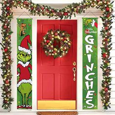 the grinch door is decorated with christmas wreaths