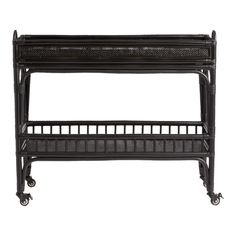 a black metal shelf with wheels and baskets on the top, against a white background