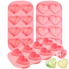 heart shaped ice trays are shown next to the molder and two pieces of candy