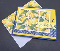 two cards with yellow flowers on them and the words happy birthday written in blue ink