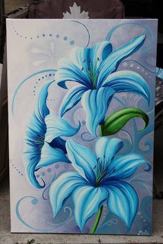 a painting of three blue flowers on a white board with swirls and bubbles in the background